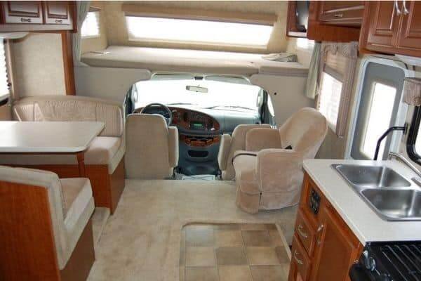 decked out rv interior with wood cabinets